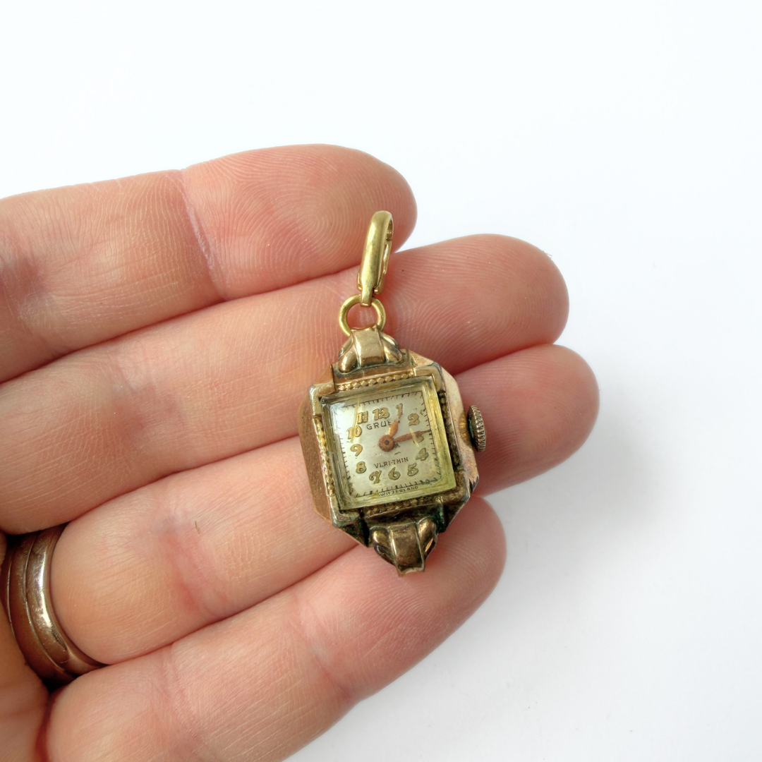 Vintage gold tone Swiss "Gruen" watch face charm