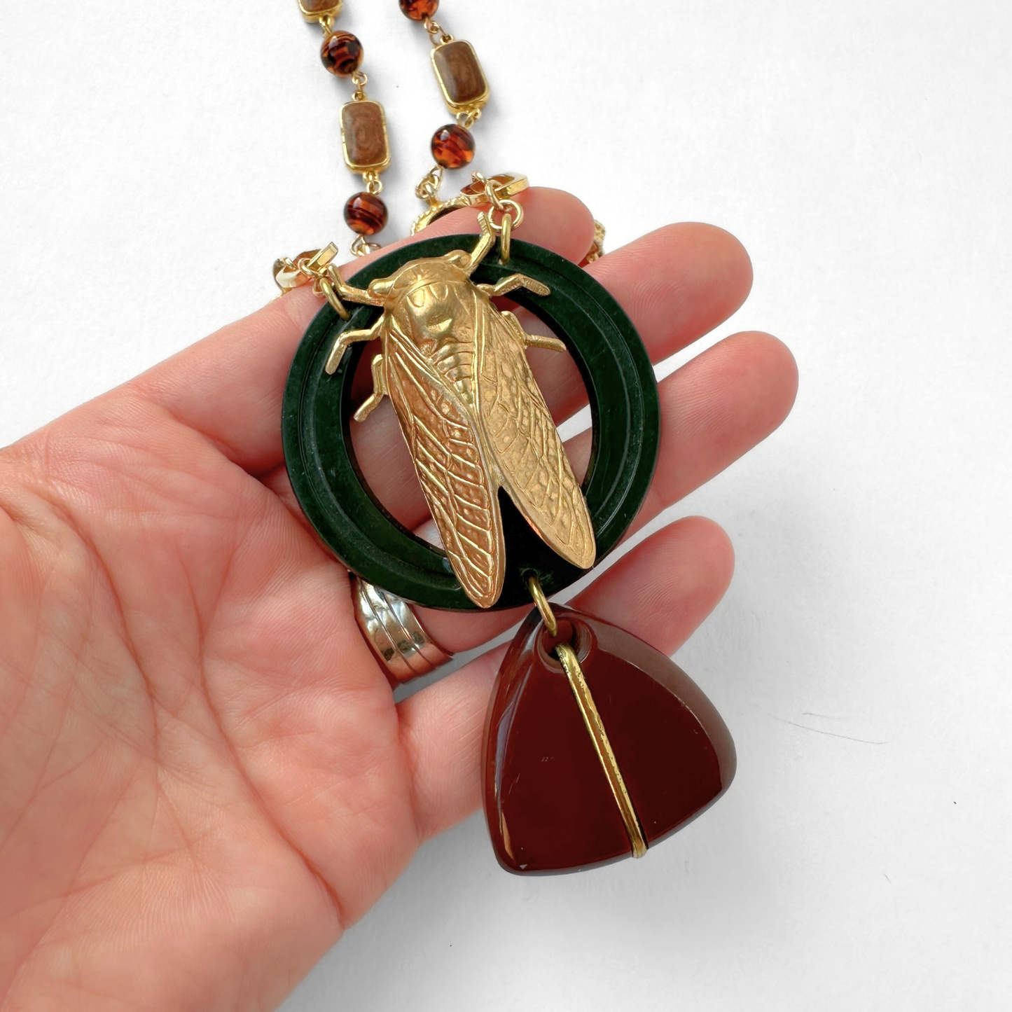 Repurposed Vintage brass Cicada assemblage necklace with bakelite drop