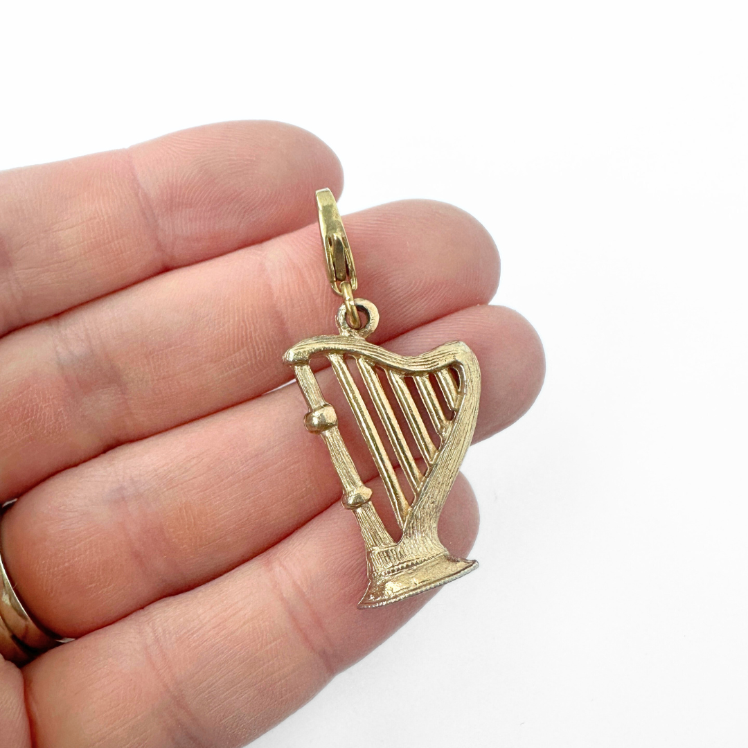 Vintage muted gold harp charm pendant