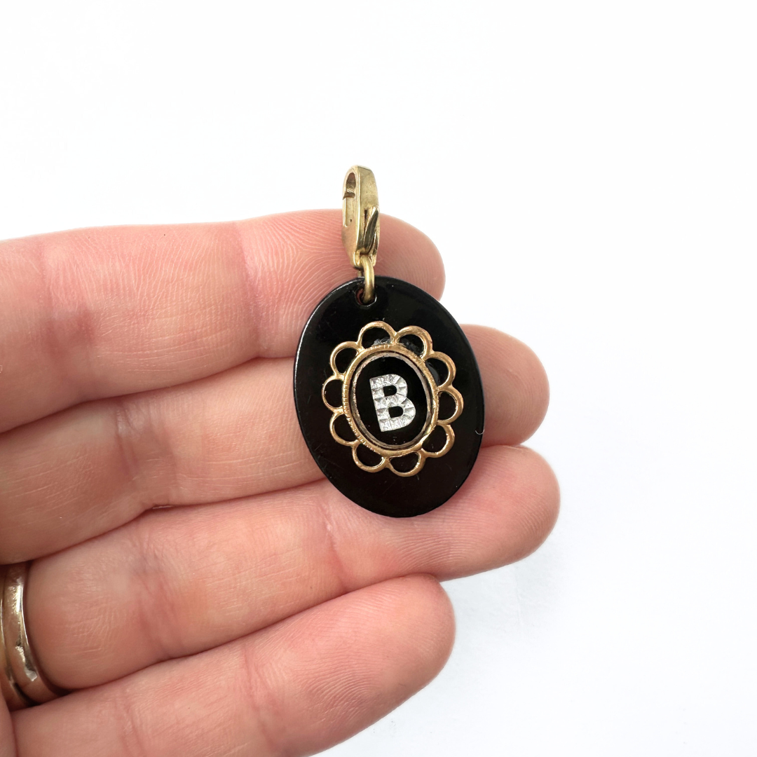 Vintage letter "B" black and brass layered oval charm