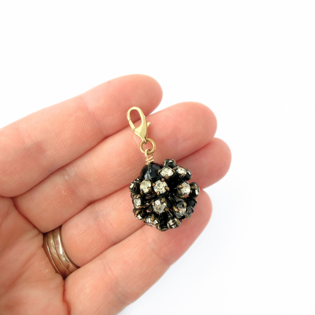 Vintage black and clear rhinestone starburst ball charm