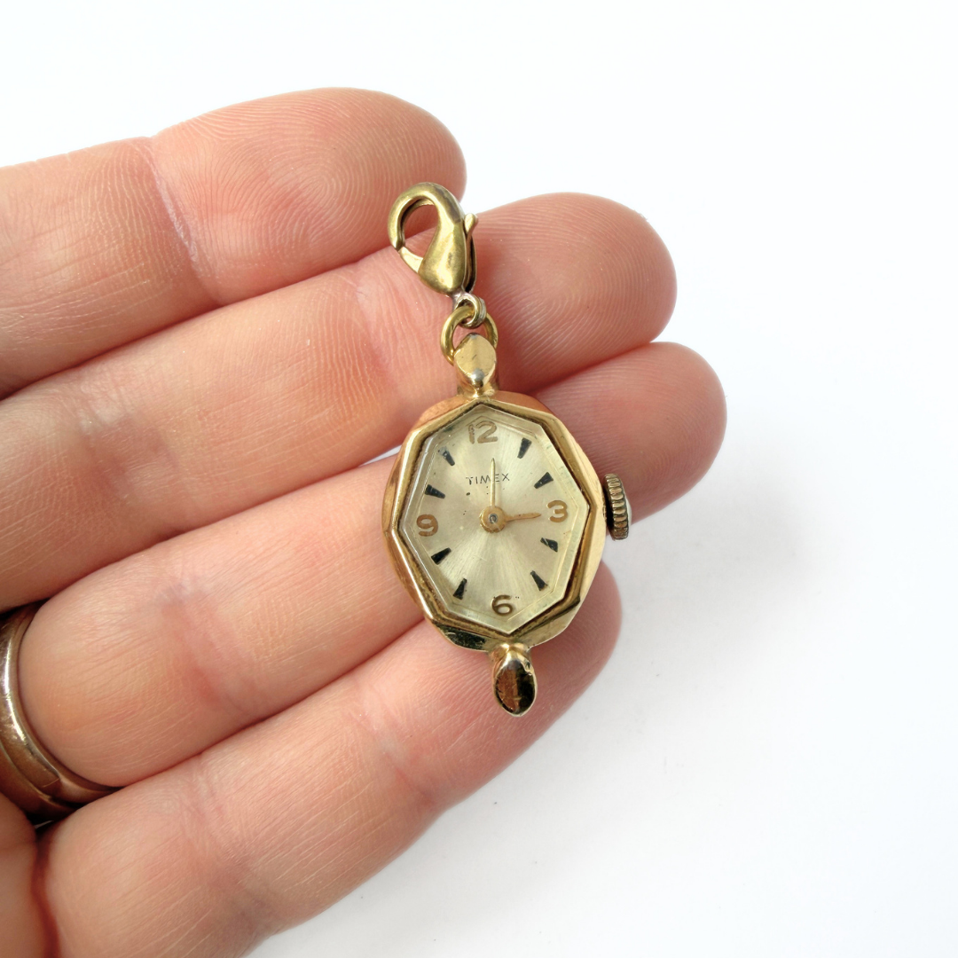 Vintage gold plated "Timex" watch face charm
