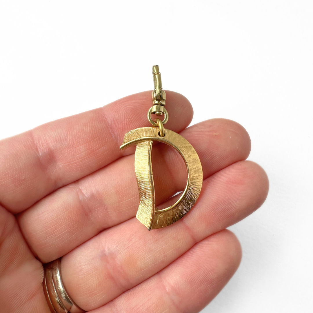 Large vintage matte gold "D" monogram charm