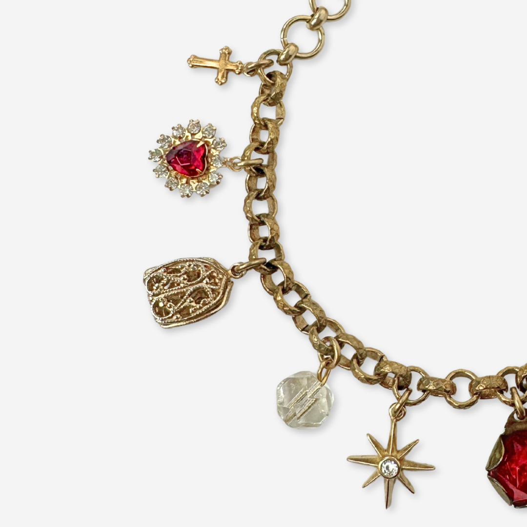 Repurposed vintage red and brass mixed charm bracelet