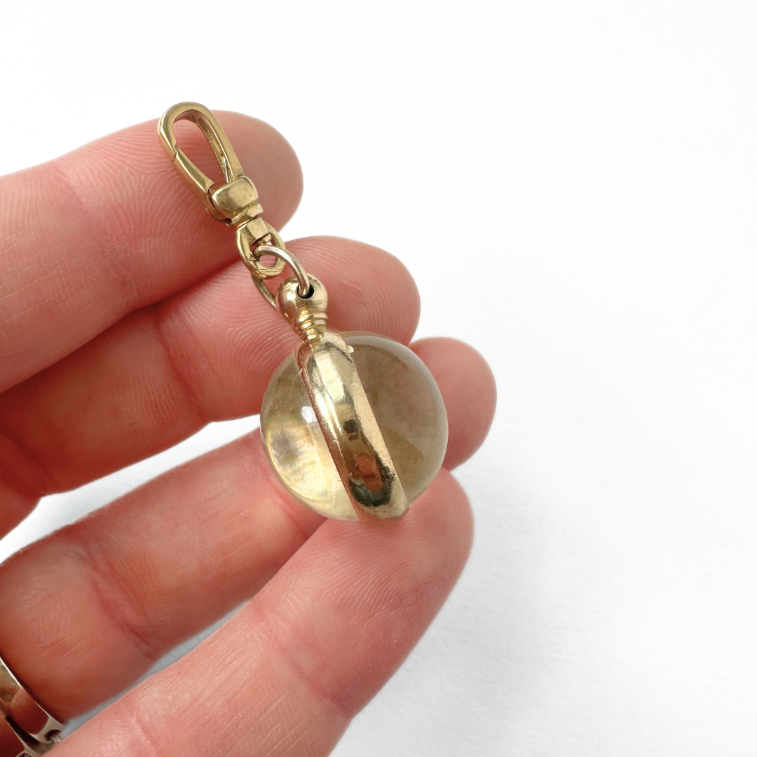 Vintage mustard seed transparent orb charm