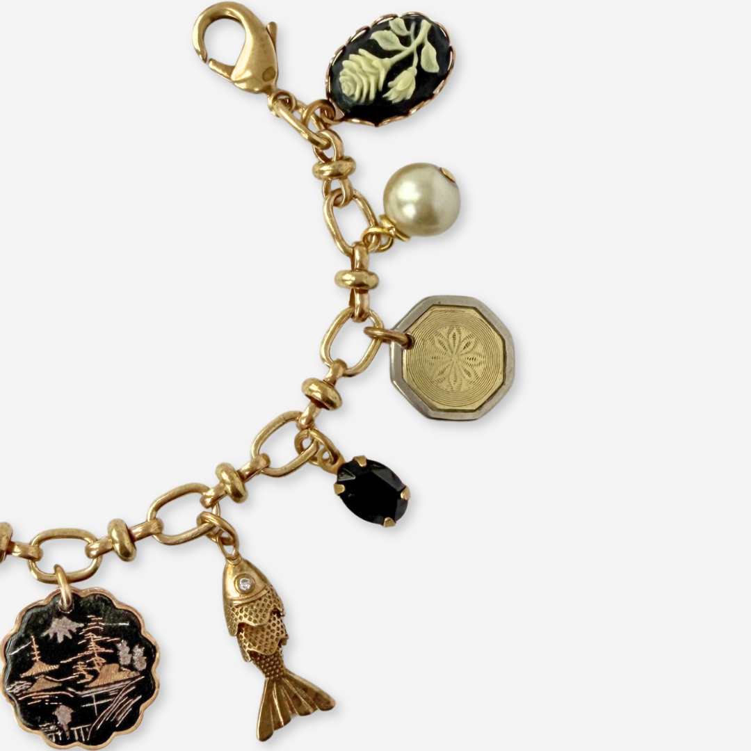 Repurposed vintage mixed charm bracelet