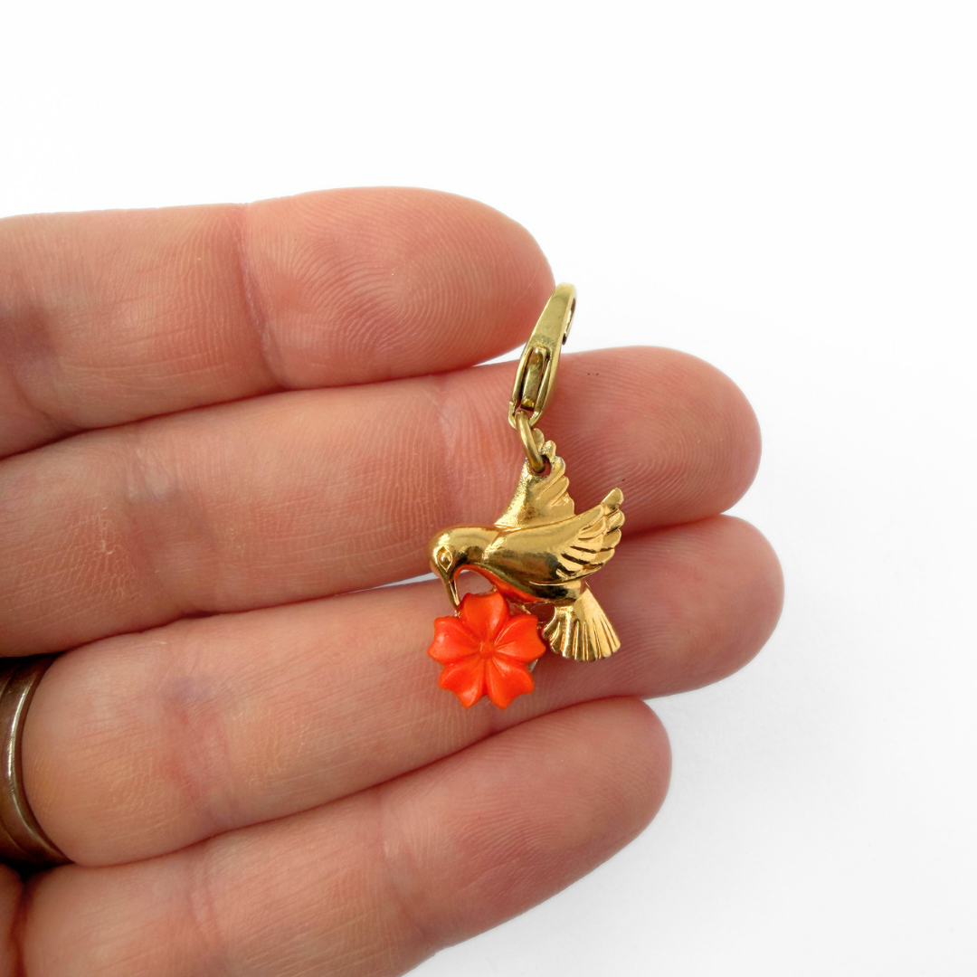 Vintage small gold plated hummingbird charm with orange flower