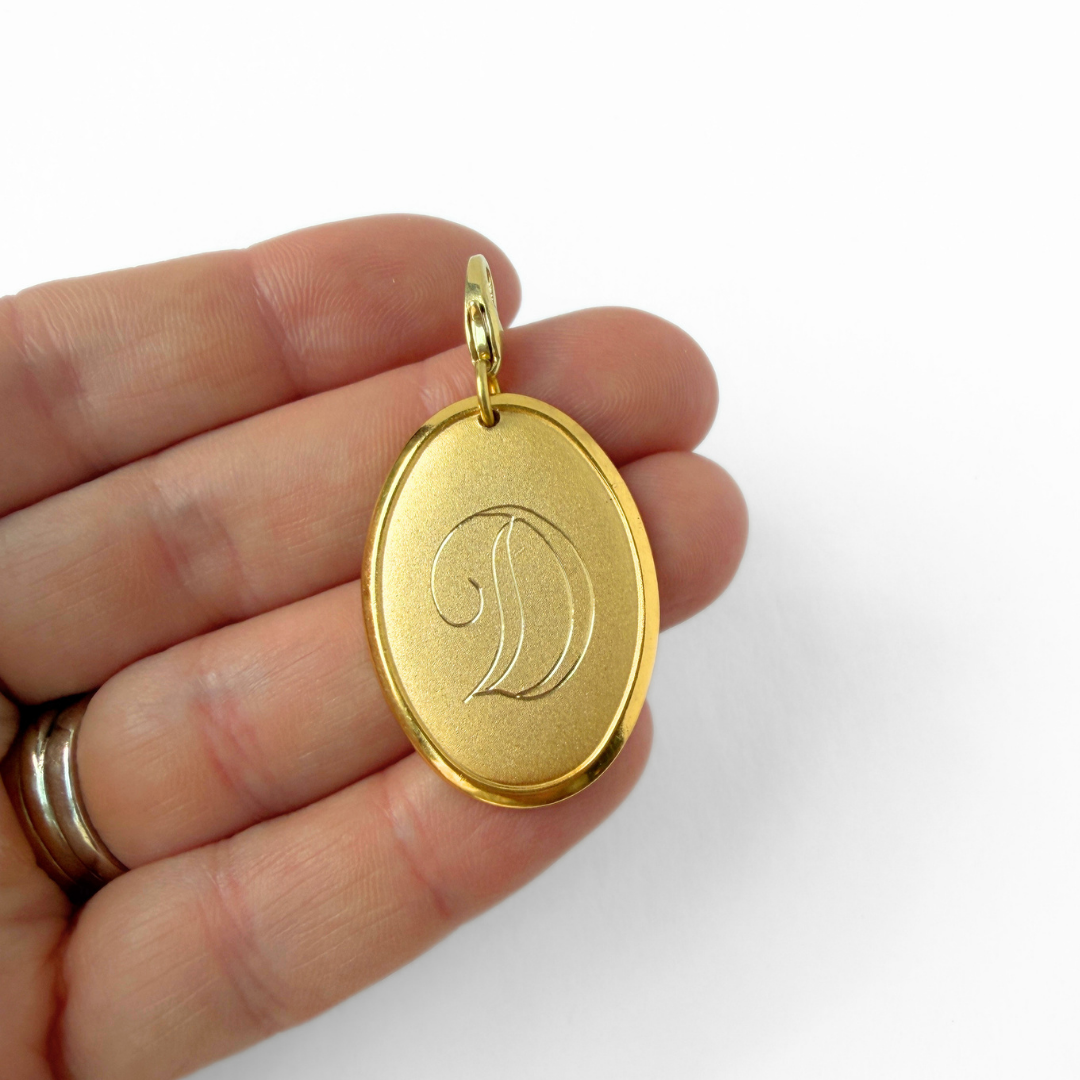 Vintage gold plated oval letter "D" monogram charm