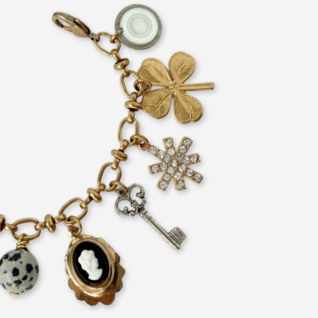 Repurposed vintage mixed neutral charm bracelet