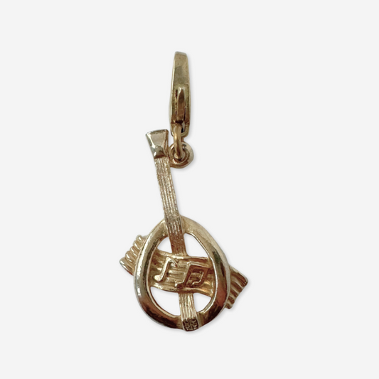 Vintage muted gold lute and music staff charm