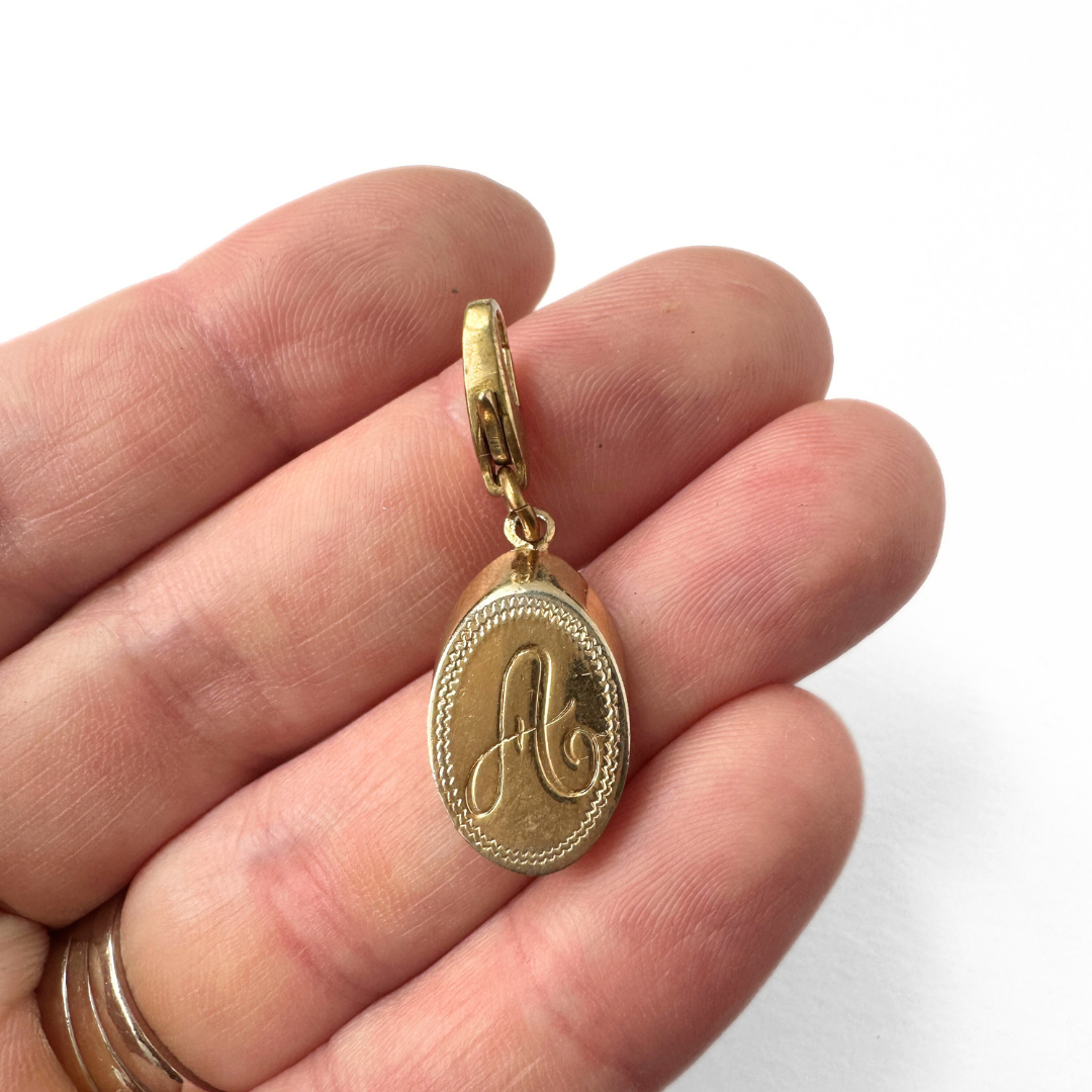 Vintage mall oval gold plated "A" monogram charm