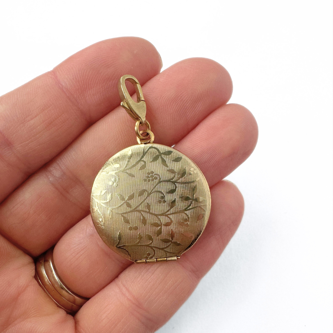 Vintage muted gold circular locket charm
