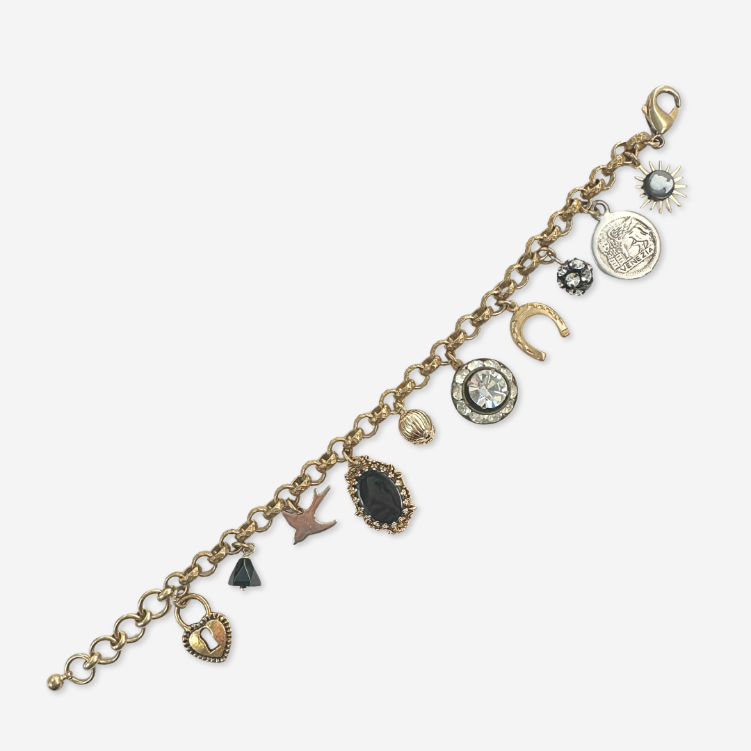 Repurposed vintage mixed charm bracelet