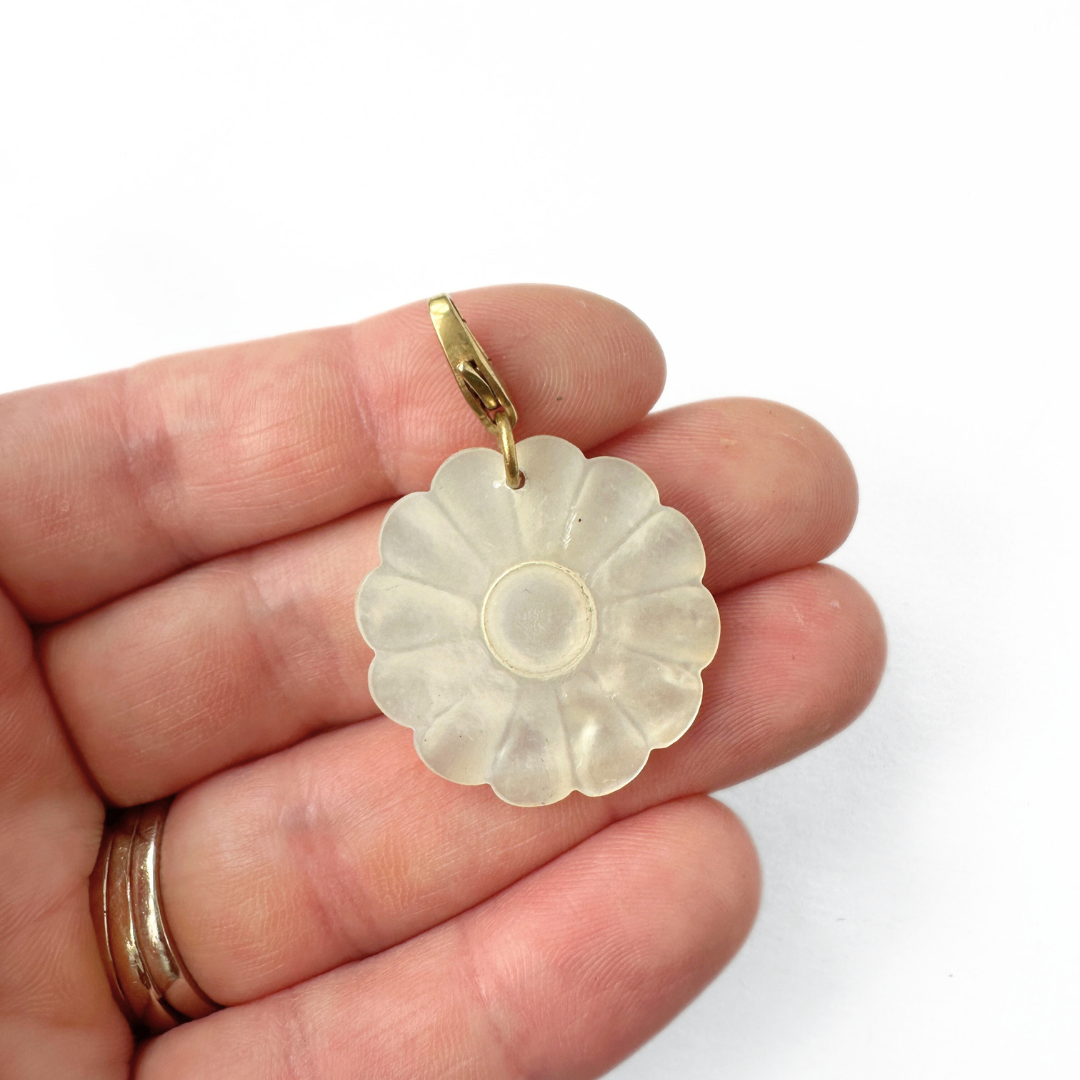 Vintage carved mother of flower charm