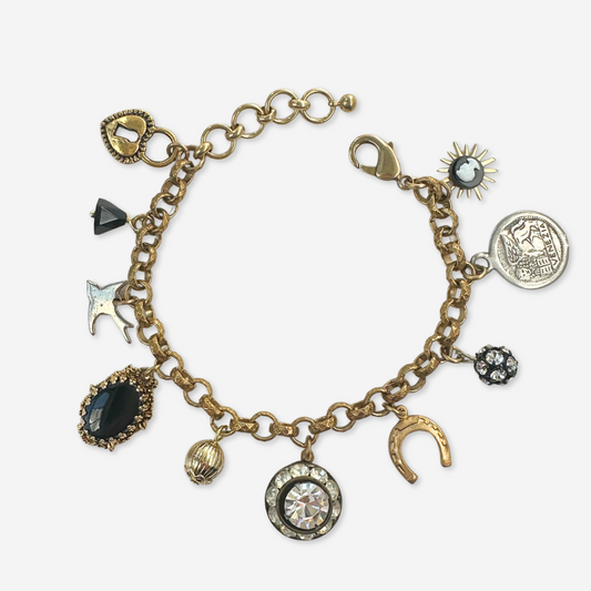 Repurposed vintage mixed charm bracelet