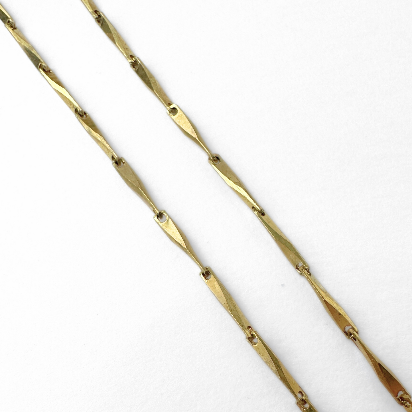 Thin brass beveled bar link blank chain