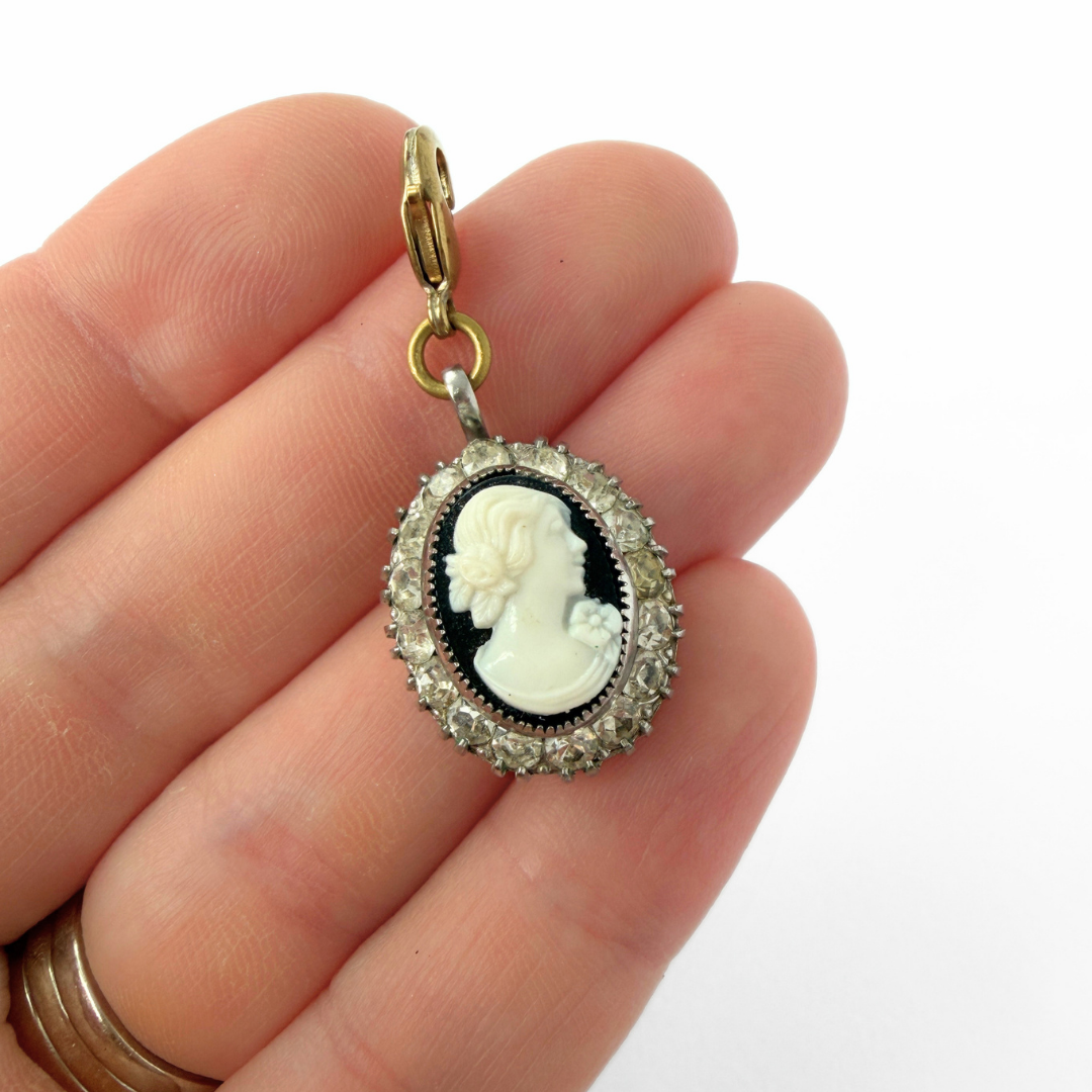 Vintage black and white cameo charm with silver rhinestone setting