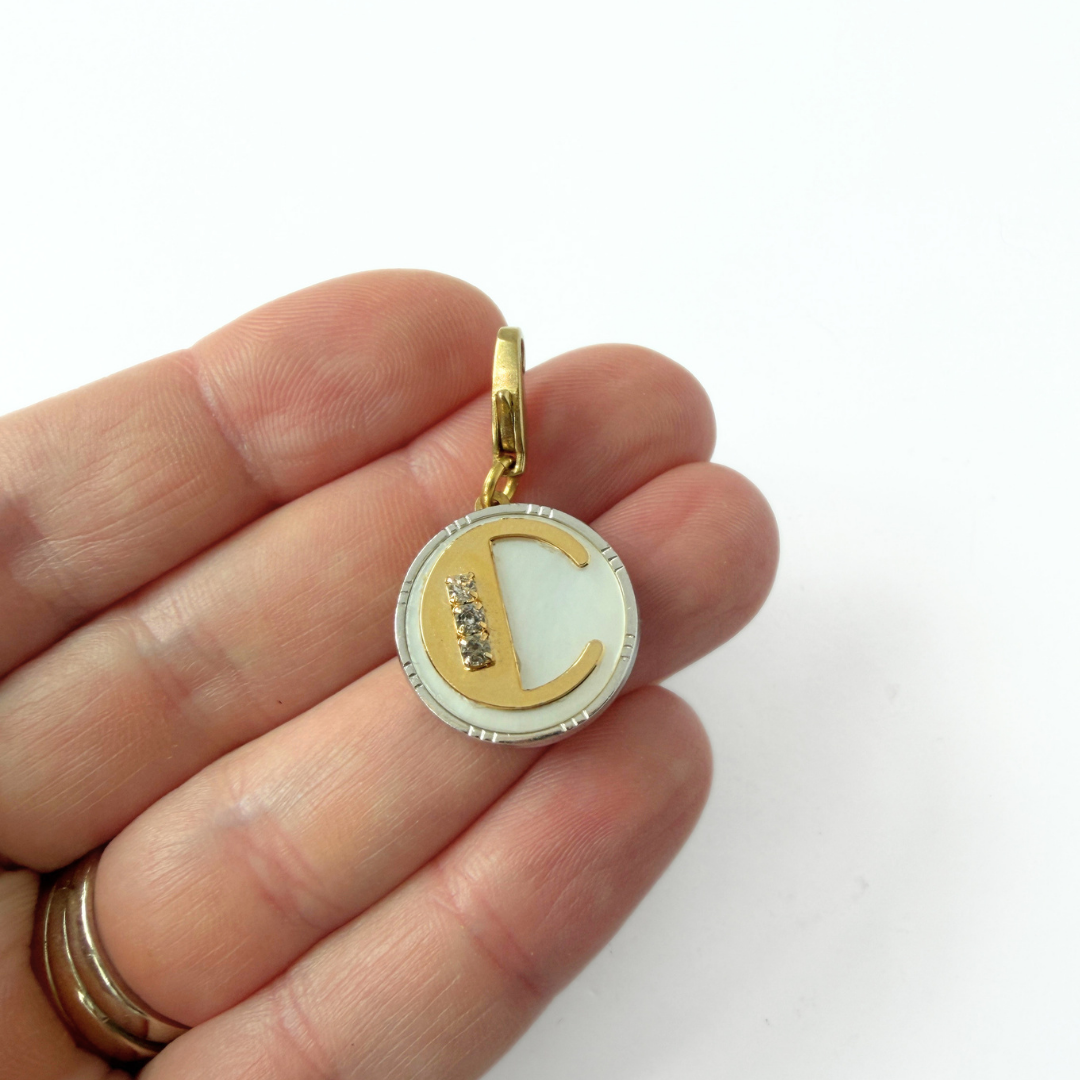 Vintage mixed metal and mother of pearl circular "C" monogram charm
