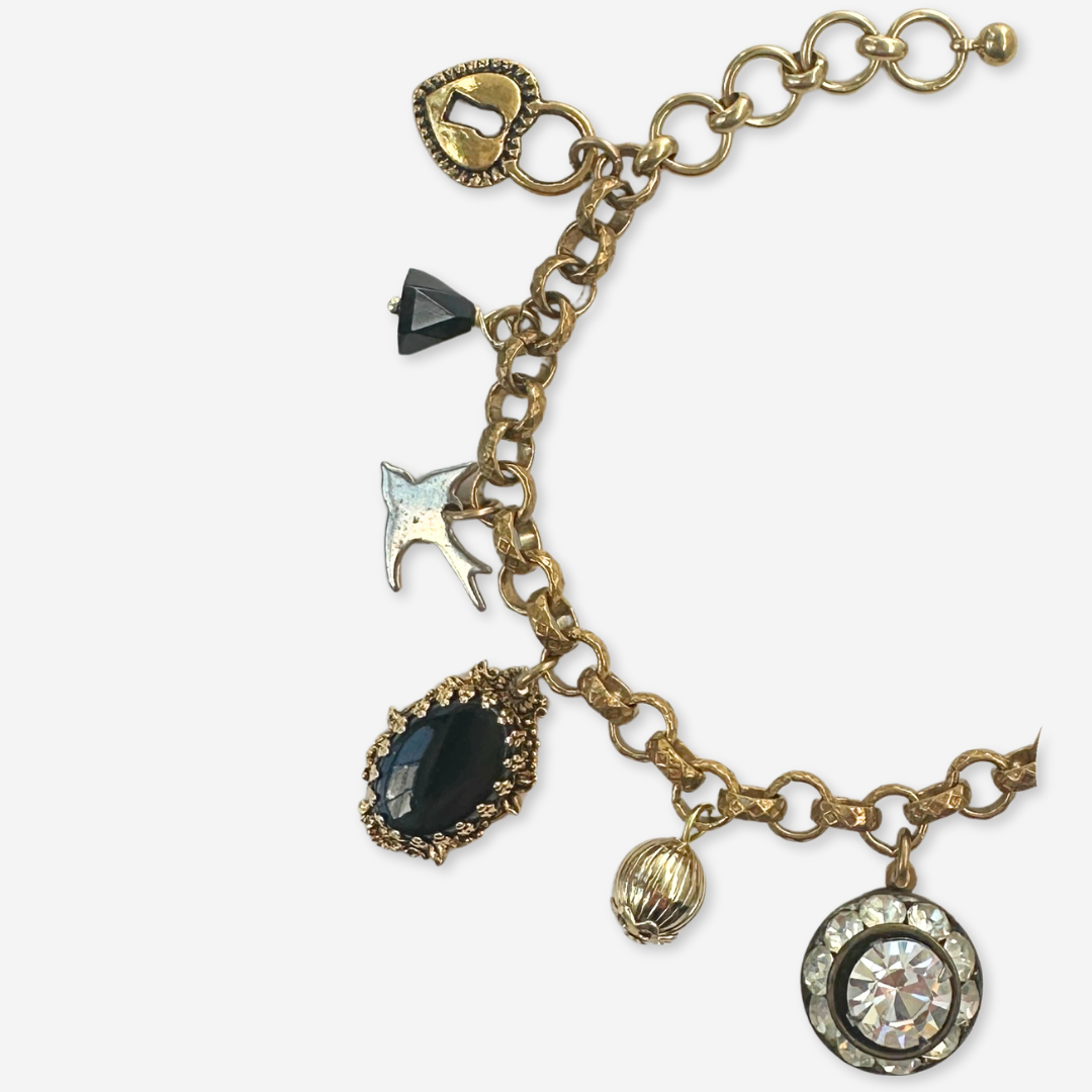 Repurposed vintage mixed charm bracelet