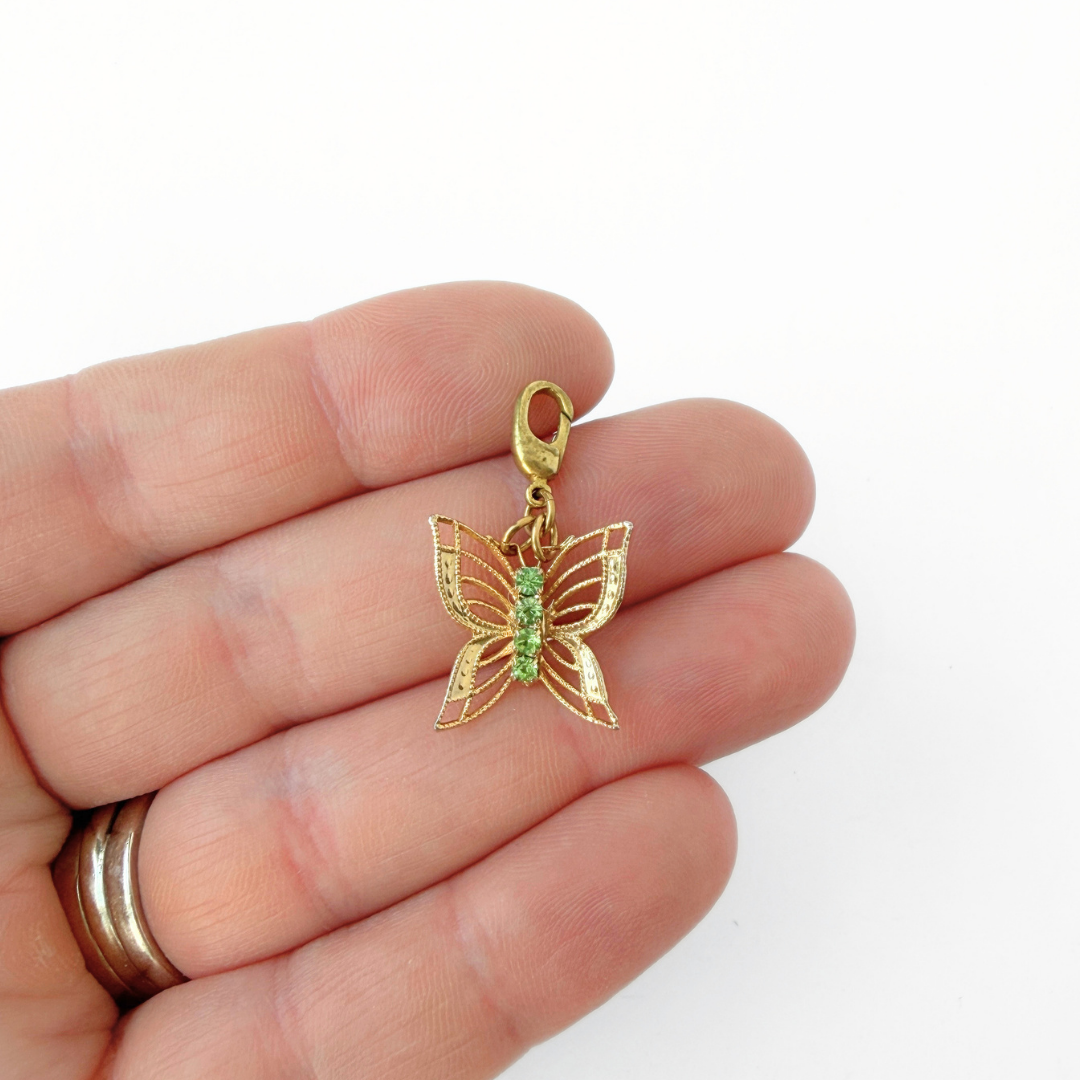 Vintage gold plated and peridot delicate filigree butterfly charm