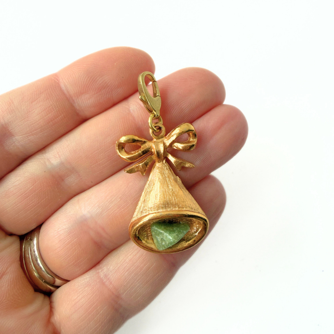 Vintage gold tone large bell charm with green stone