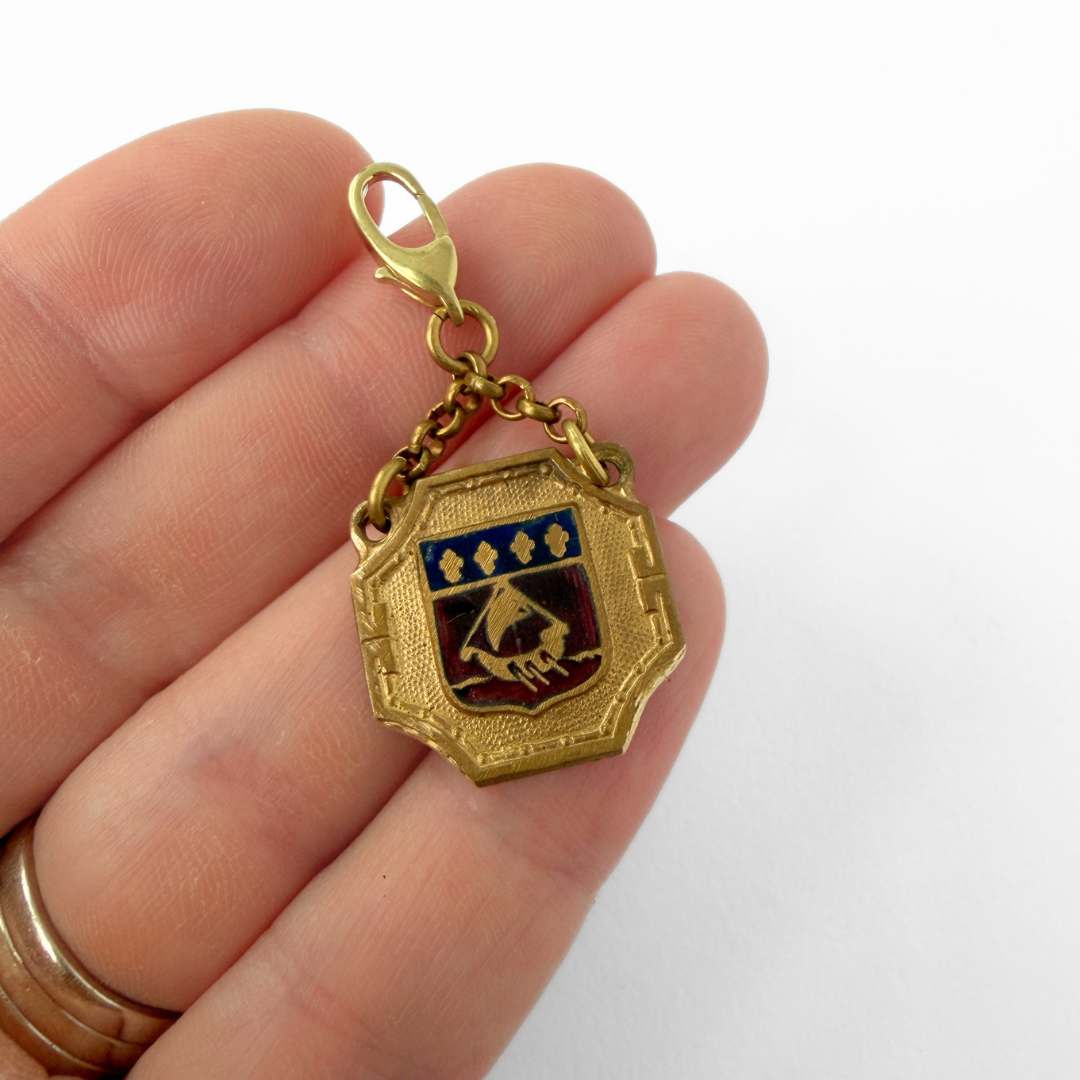 Vintage aged brass Parisian medal charm: Coat of Arms
