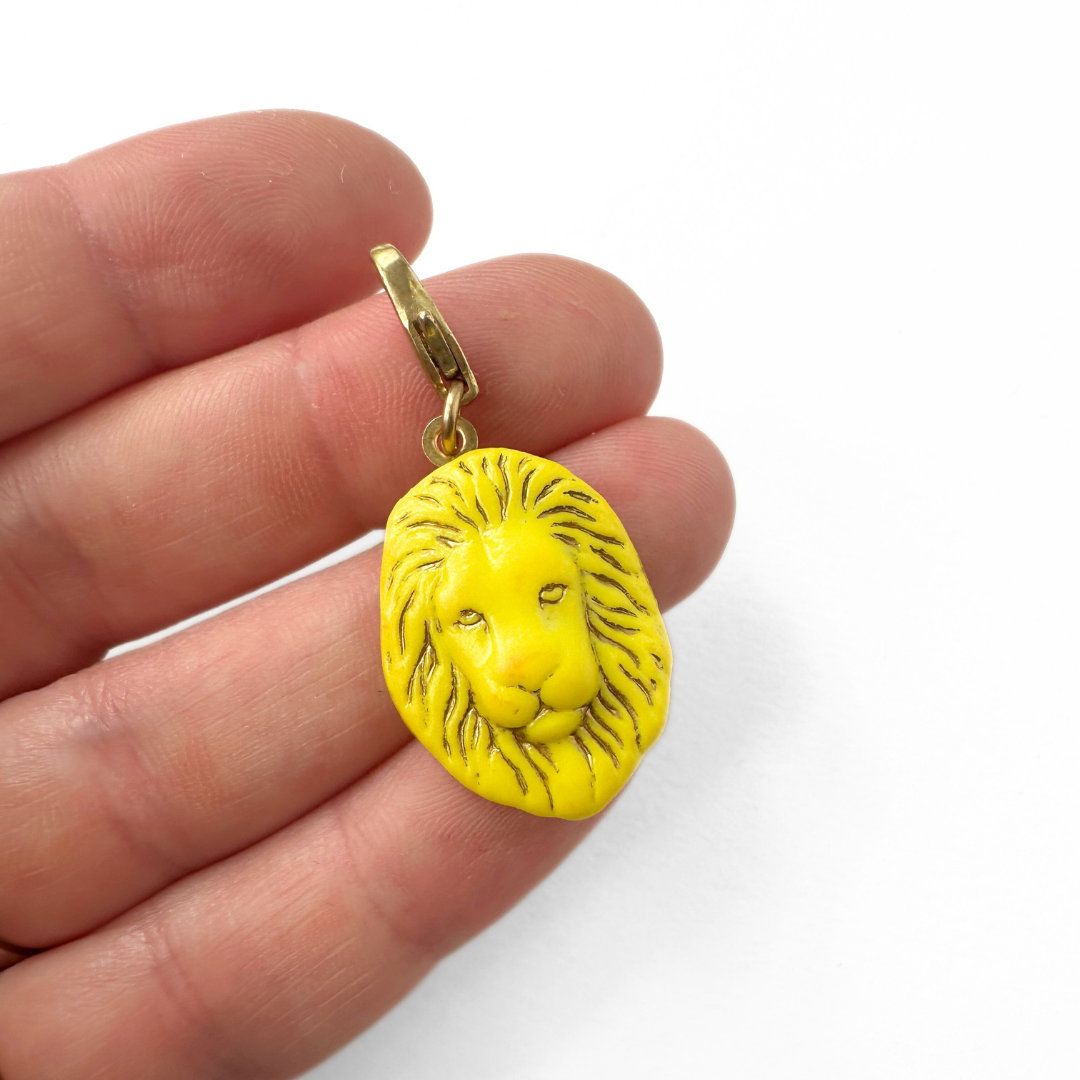 Vintage yellow lion charm