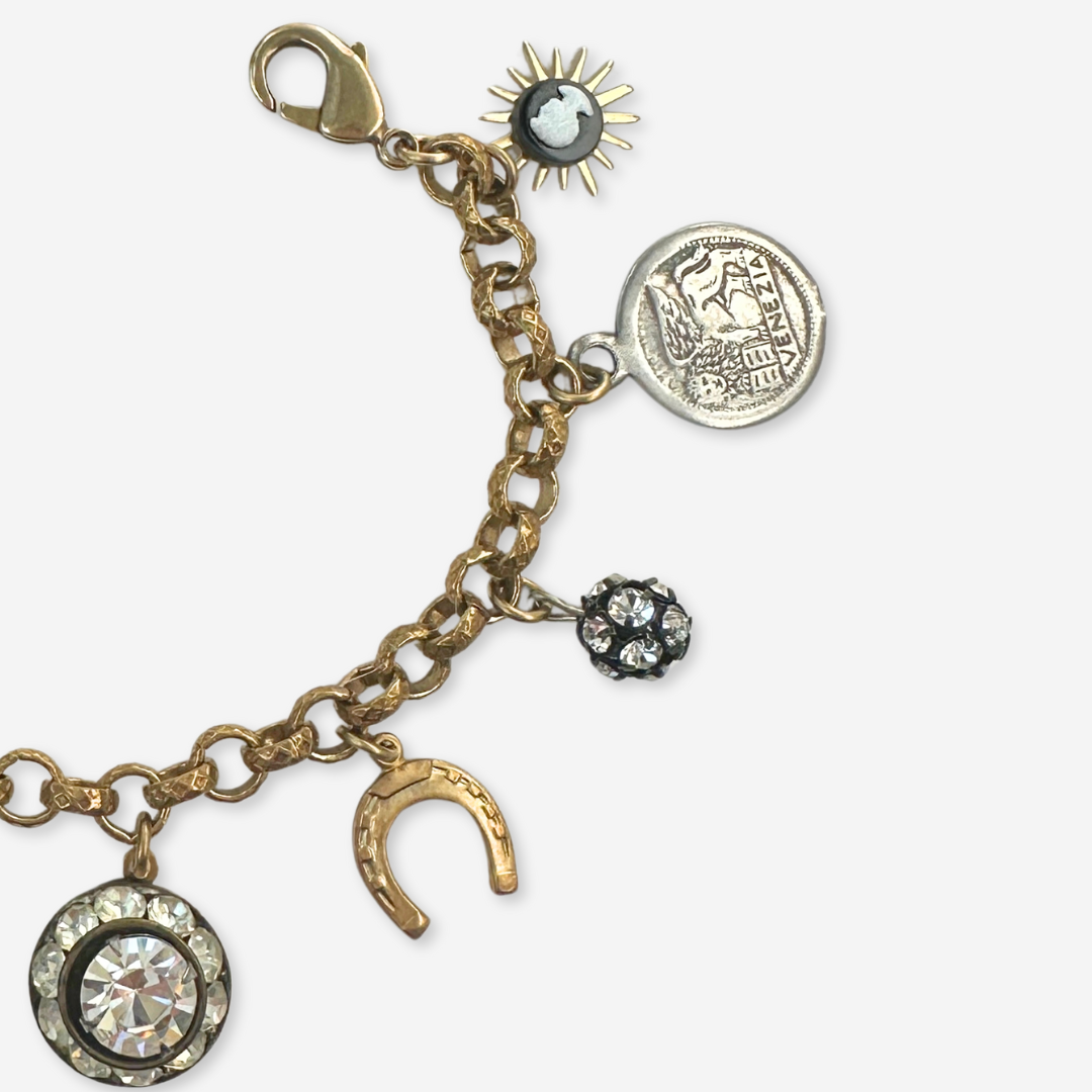 Repurposed vintage mixed charm bracelet