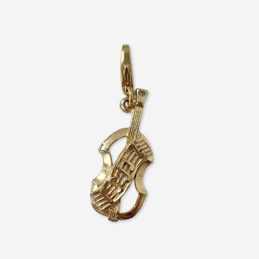 Vintage muted gold violin and music staff charm