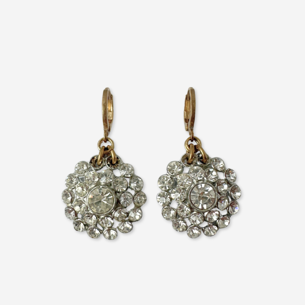 Pair of vintage-style earrings with crystal embellishments on a white background