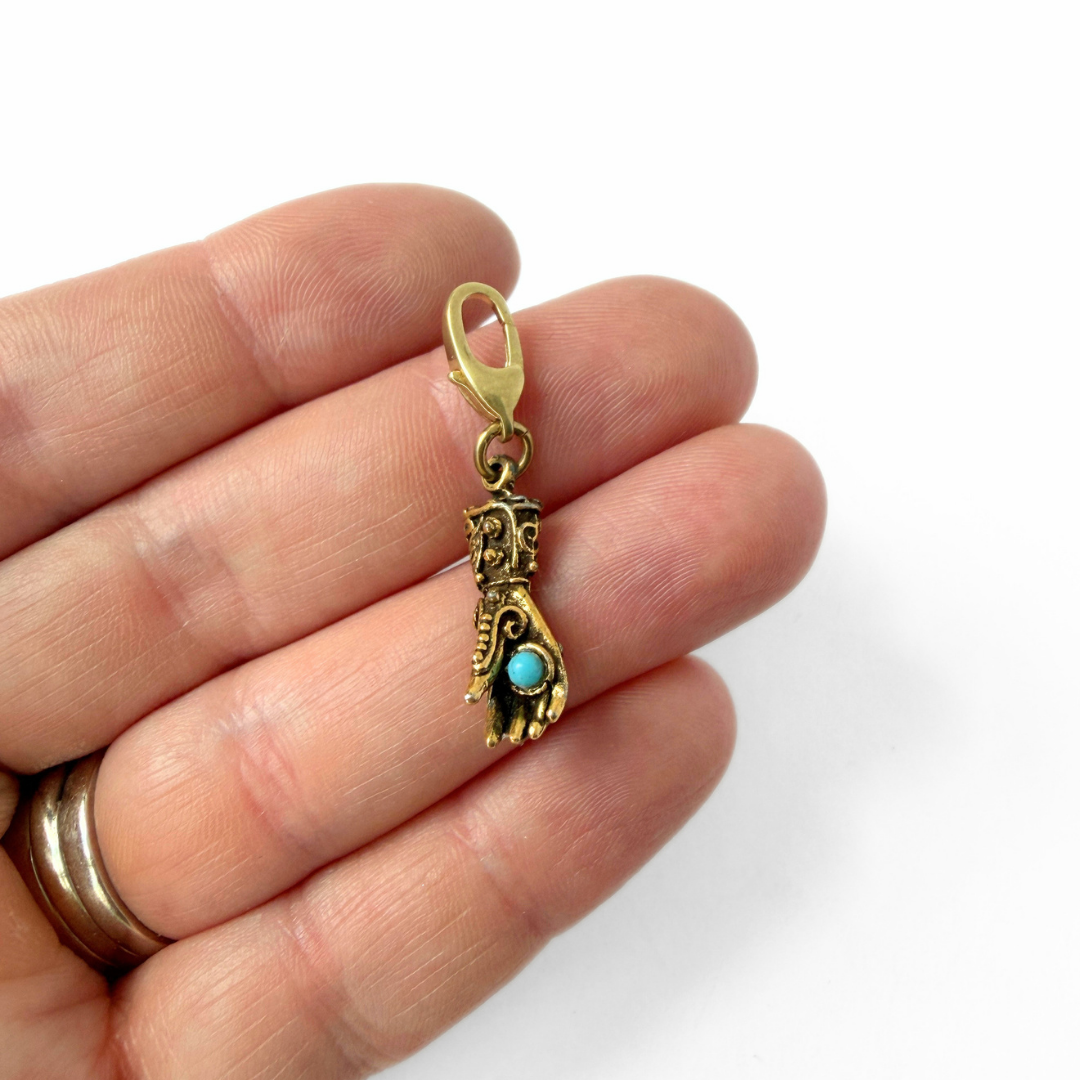 Vintage small antique gold tone Victorian hand charm
