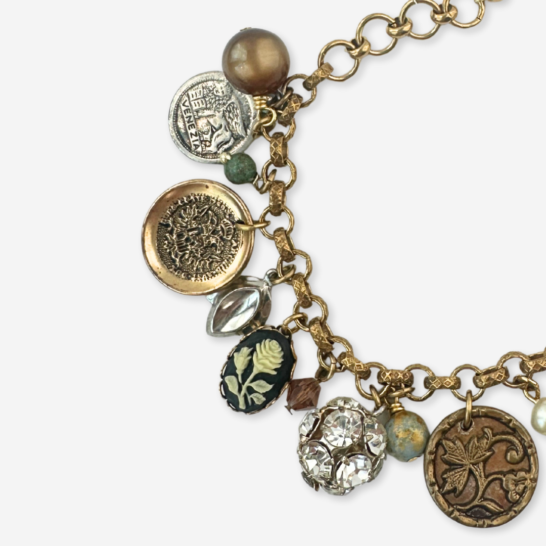 Repurposed vintage loaded mixed charm bracelet