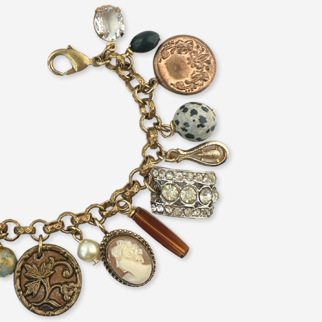 Repurposed vintage loaded mixed charm bracelet