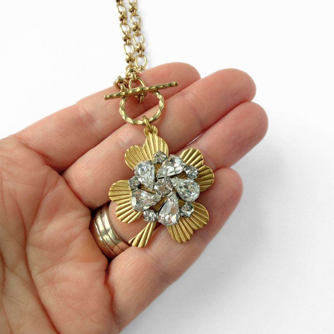 Large solid brass four leaf clover pendant with vintage clear rhinestone embellishment