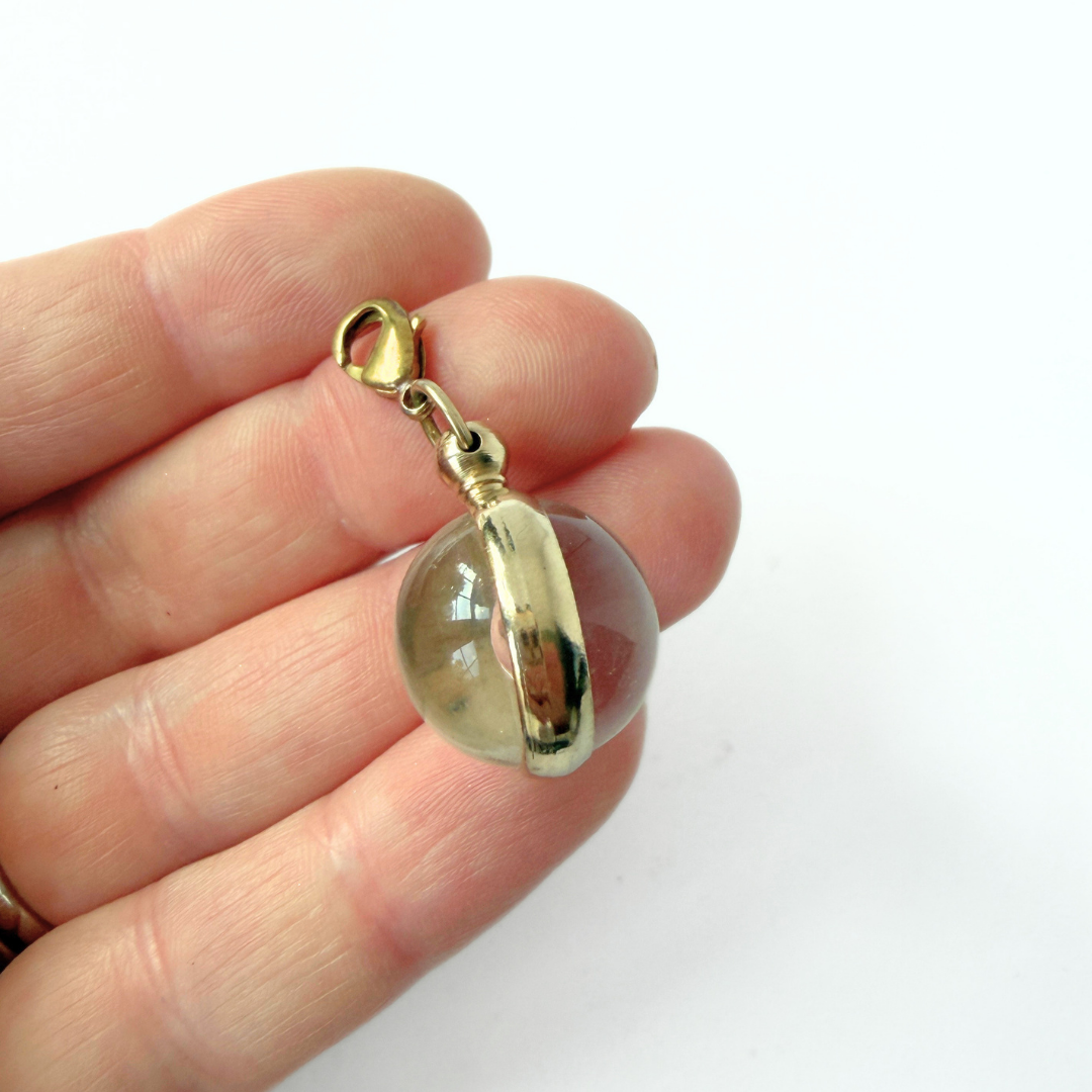 Vintage mustard seed transparent orb charm