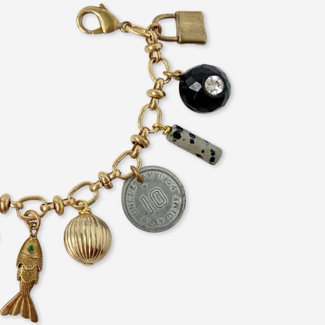 Repurposed vintage mixed charm bracelet
