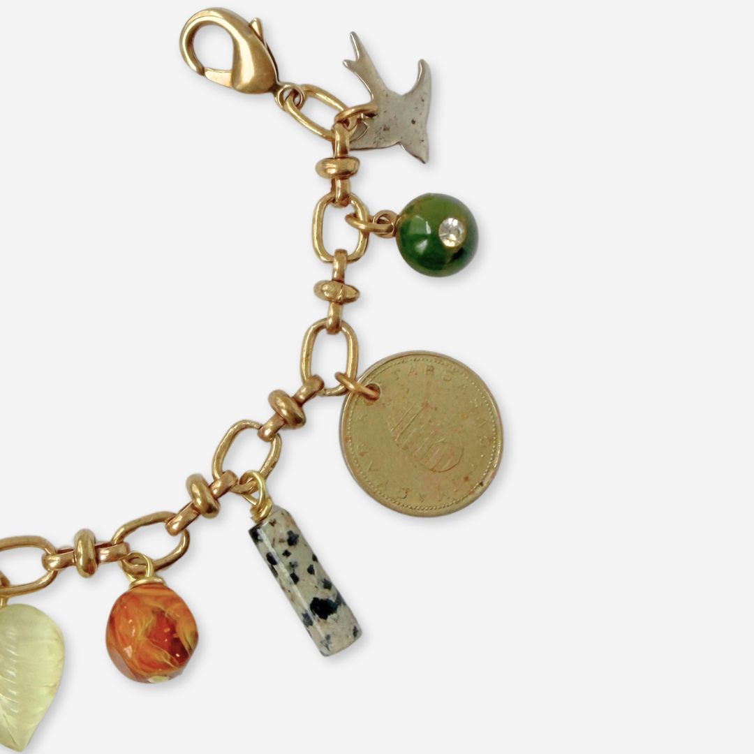 Repurposed vintage mixed charm bracelet