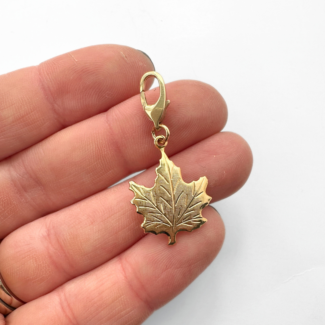 Vintage small gold plated maple leaf charm