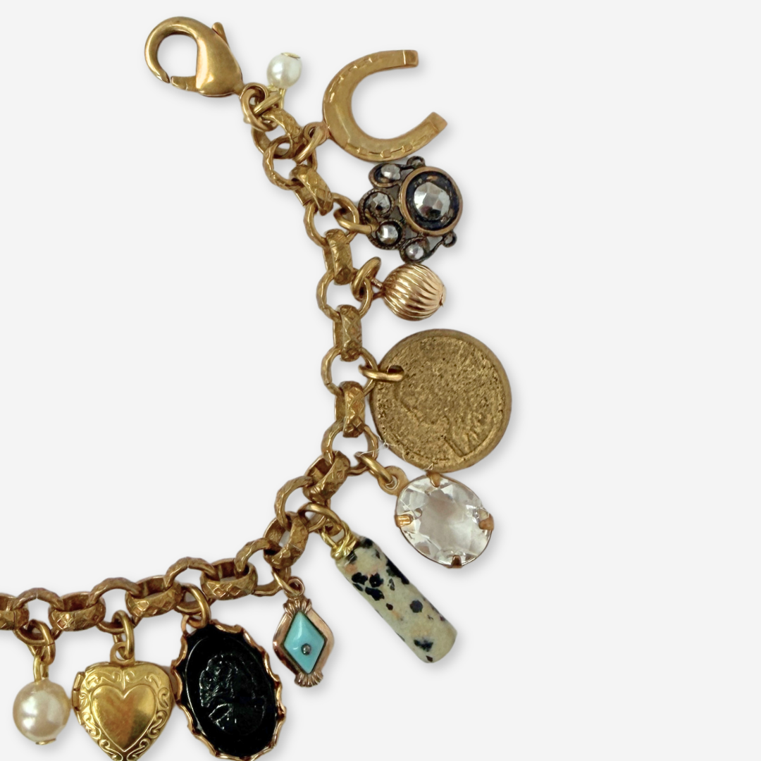 Loaded repurposed vintage mixed charm bracelet