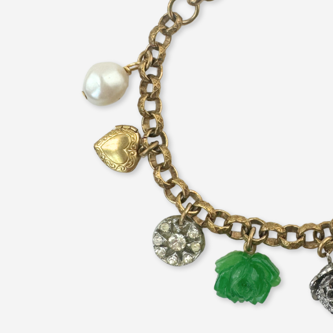 Repurposed vintage green and gold mixed charm bracelet