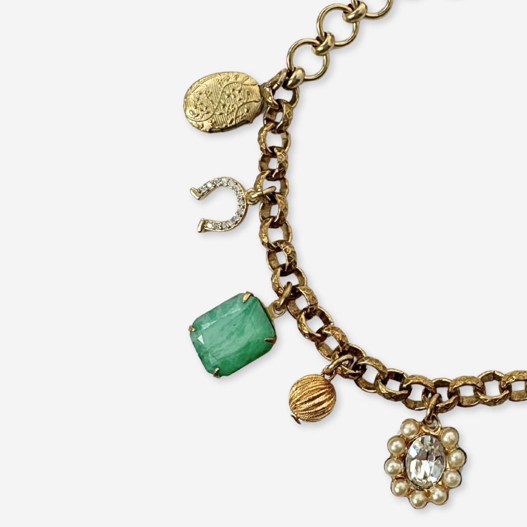 Repurposed vintage green mixed charm bracelet