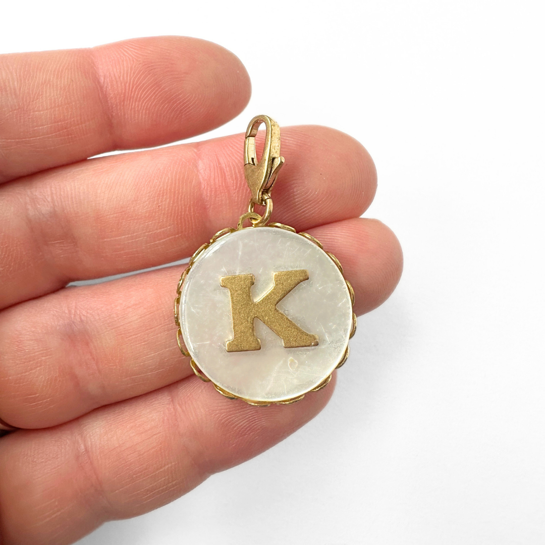 Vintage mother of pearl and brass "K" circle monogram charm