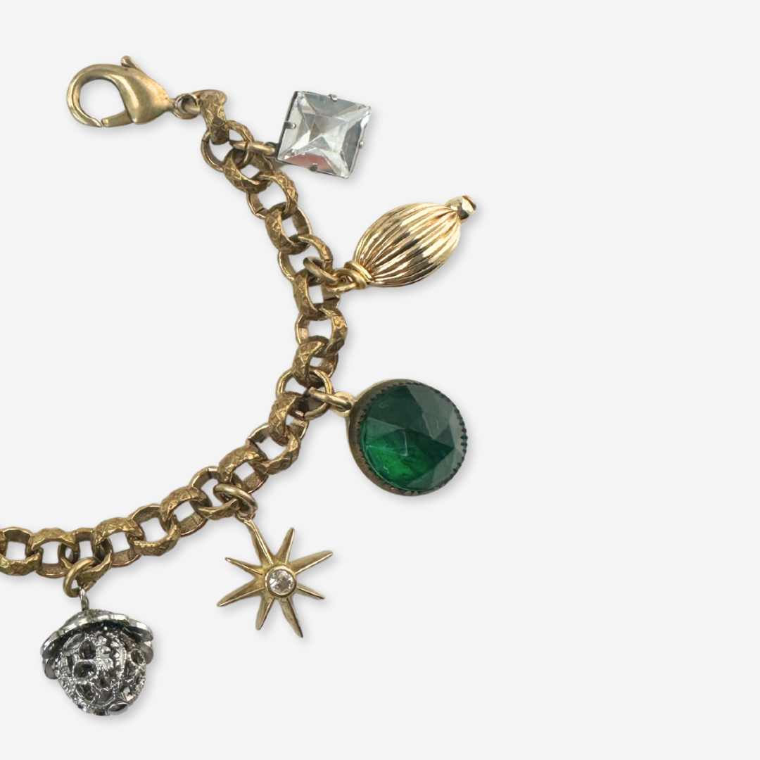 Repurposed vintage green and gold mixed charm bracelet