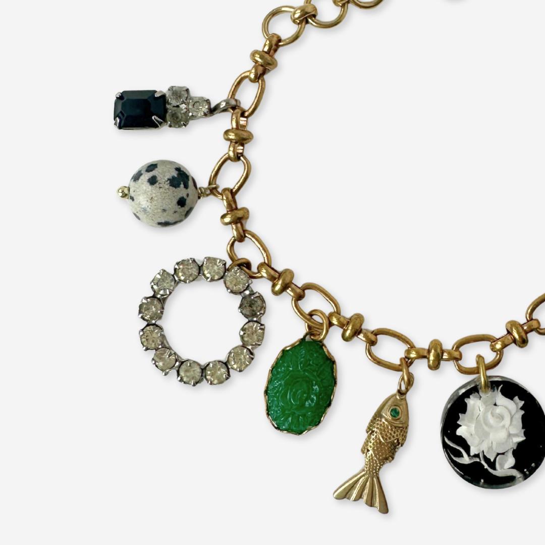 Repurposed vintage mixed charm bracelet