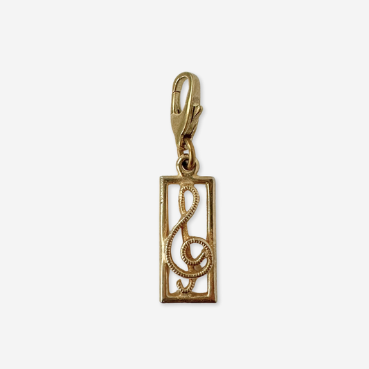 Vintage muted gold rectangular treble clef charm