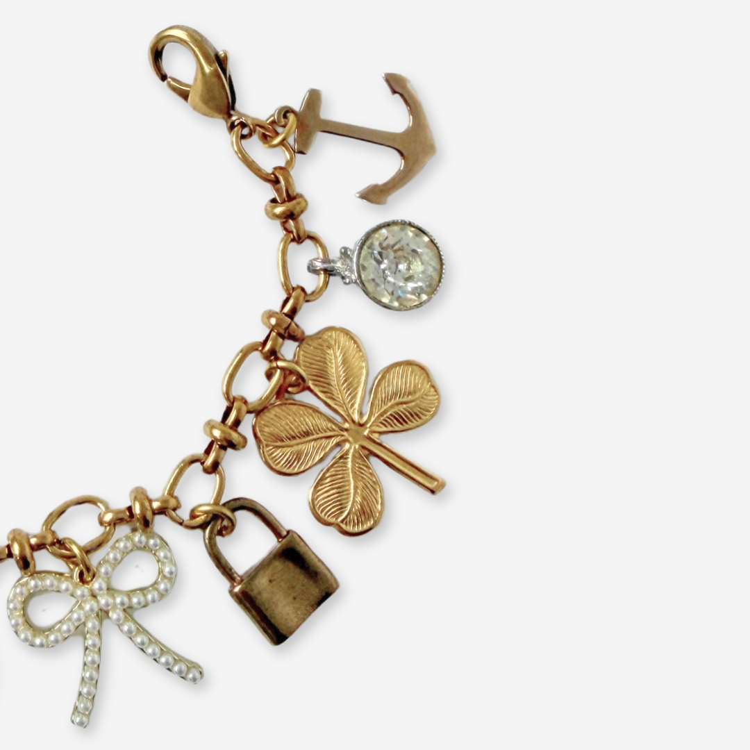 Repurposed vintage mixed neutral charm bracelet