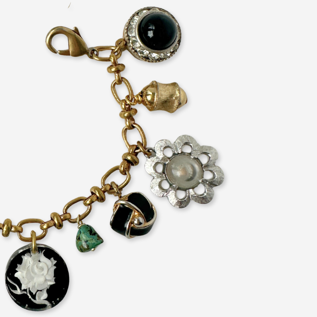 Repurposed vintage mixed charm bracelet