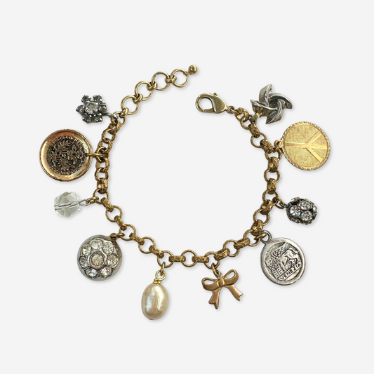 Repurposed vintage neutral mixed charm bracelet