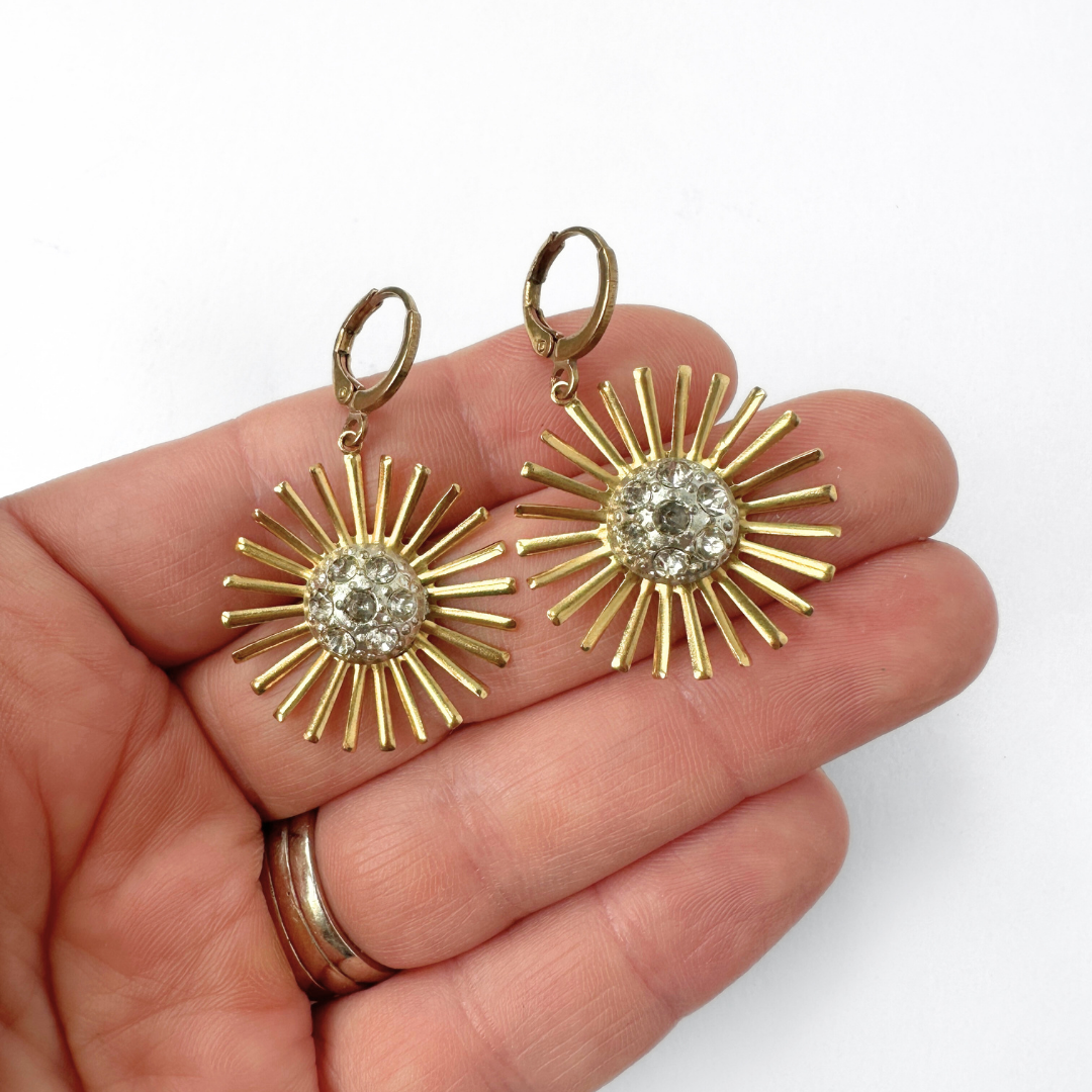 Brass sunburst earrings with clear vintage rhinestone centers