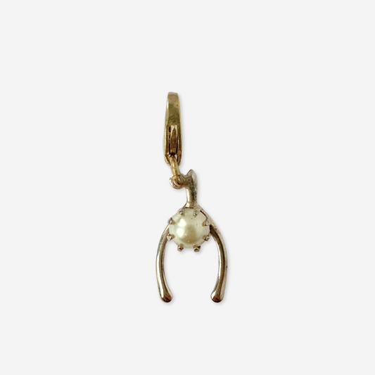 Dainty vintage muted gold wishbone charm with pearl accent